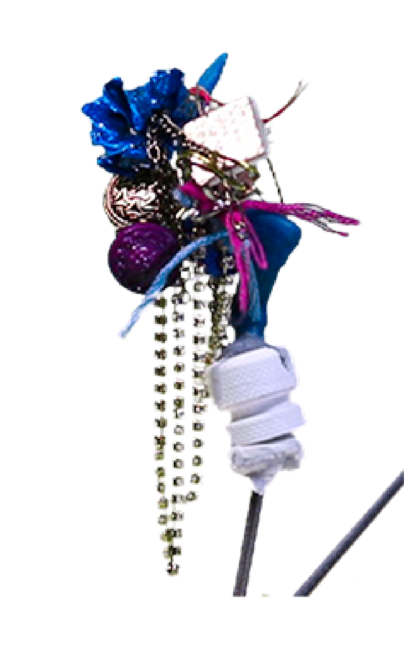 A photograph of a shiny blue, purple, and gold miniature headdress mounted on a metal arm.